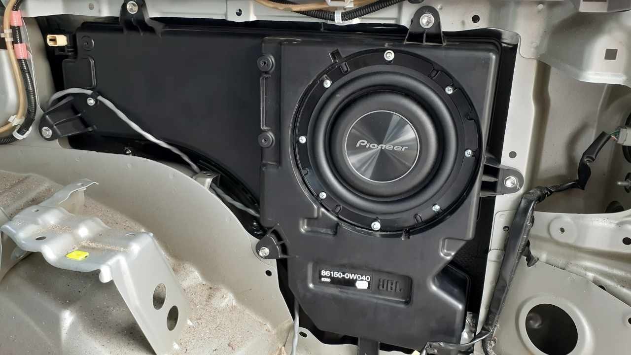Pioneer subwoofer mounted in OEM enclosure TOYOTA 4-RUNNER— bass install JH Audio Bowling Green VA