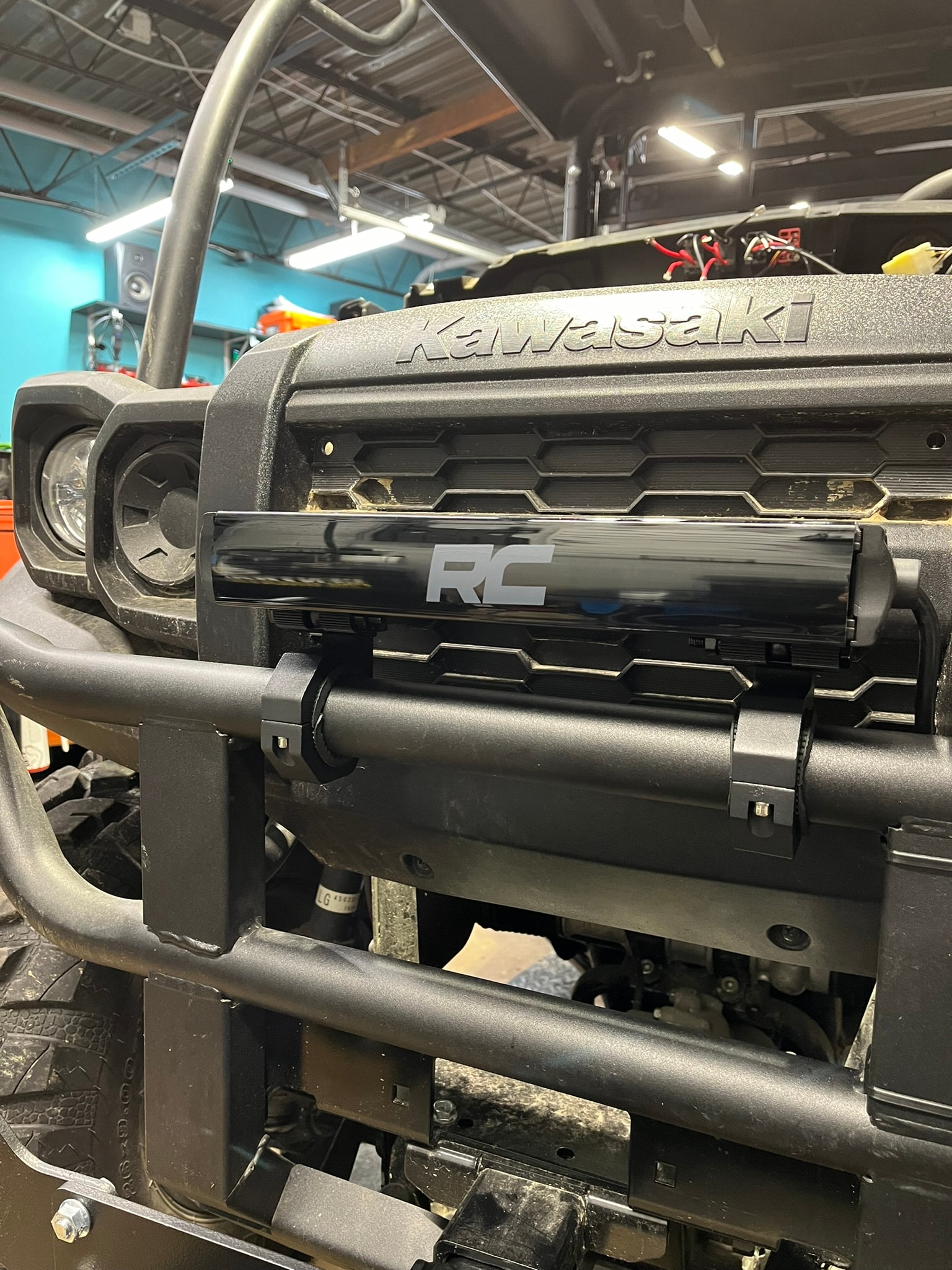 Kawasaki UTV with Rough Country LED light bar — custom upfitting by JH Audio